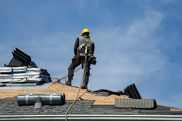 Professional Roof Replacement technician working in Watertown, MA